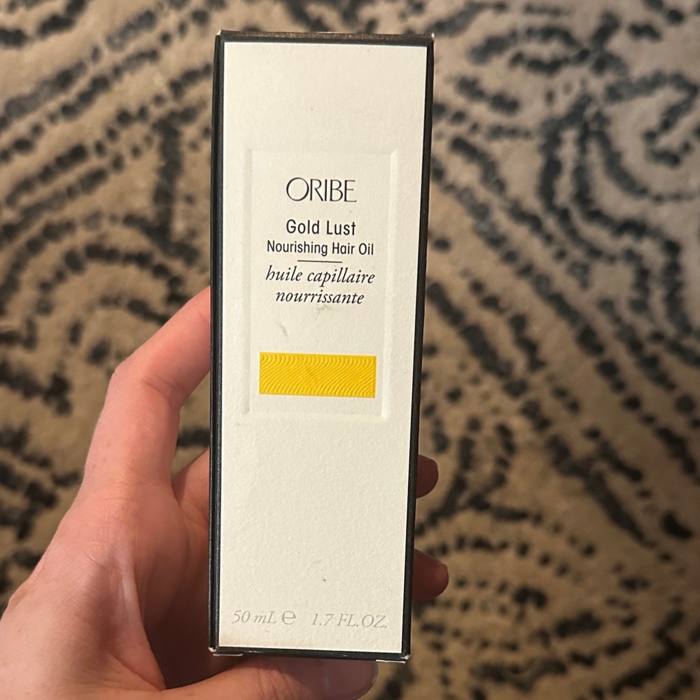 Oribe Gold Lust Nourishing Hair Oil - White and Gold Packaging